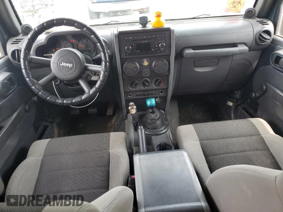 2007 Jeep Wrangler Unlimited X with VIN 1J4GA39117L119395, listed as a Copart auction lot 52588055 with 160,335 mi miles and Salvage title. Bid and sale history available at DreamBid. Image 8.