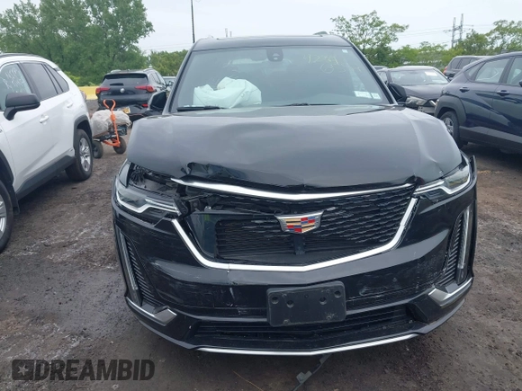 2024 Cadillac XT6 AWD Luxury z VIN 1GYKPBR49RZ723838, wystawiony jako IAAI lot #42346554 z przebiegiem 27 525 mil mil oraz . Historia ofert i sprzedaży dostępna na DreamBid. Obrazek 6.