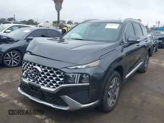 2023 Hyundai Santa Fe Limited with VIN 5NMS5DA19PH013204, listed as a IAAI auction lot 41909727 with 17,206 mi miles and . Bid and sale history available at DreamBid. Image 2.