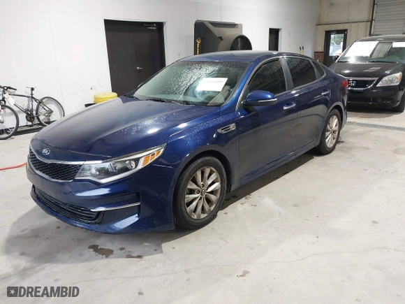 2016 Kia Optima LX with VIN 5XXGT4L37GG059994, listed as a IAAI auction lot 42018609 with 127,394 mi miles. Bid and sale history available at carsss.com. Image 17.
