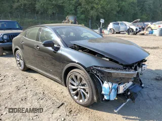 2023 Toyota Crown XLE with VIN JTDAAAAF4P3015538, listed as a Copart auction lot 71072944 with 5,658 mi miles and Salvage Title. Bid and sale history available at carsss.com. Image 4.