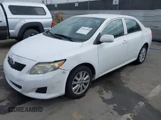 2009 Toyota Corolla with VIN 1NXBU40E99Z082845, listed as a IAAI auction lot 42046564 with 180,910 mi miles. Bid and sale history available at carsss.com. Image 2.