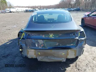 2022 Tesla Model 3 Long Range with VIN 5YJ3E1EB0NF365284, listed as a IAAI auction lot 41899706 with 36,463 mi miles and . Bid and sale history available at DreamBid. Image 6.