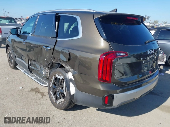 2023 Kia Telluride S with VIN 5XYP6DGC2PG387093, listed as a IAAI auction lot 42299026 with 12,895 mi miles and . Bid and sale history available at DreamBid. Image 3.