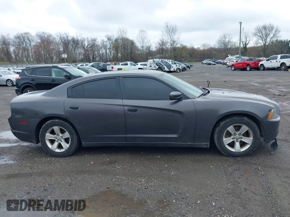 2014 Dodge Charger SE with VIN 2C3CDXBG8EH117241, listed as a IAAI auction lot 41952443 with 158,432 mi miles and . Bid and sale history available at DreamBid. Image 13.