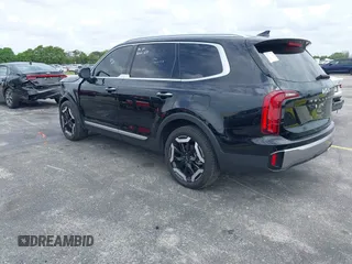 2025 Kia Telluride S with VIN 5XYP6DGC8SG590319, listed as a IAAI auction lot 42625086 with 14,392 mi miles and . Bid and sale history available at DreamBid. Image 3.