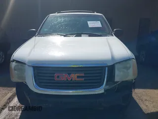 2003 GMC Envoy SLT with VIN 1GKDT13S432190085, listed as a IAAI auction lot 42106915 with 289,933 mi miles. Bid and sale history available at carsss.com. Image 6.