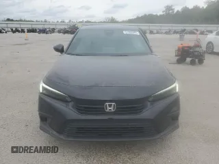 2023 Honda Civic Sport z VIN 2HGFE2F57PH520634, wystawiony jako Copart lot #51852665 z przebiegiem 52 641 mil mil oraz Szkoda całkowita • Salvage title. Historia ofert i sprzedaży dostępna na DreamBid. Obrazek 5.