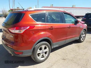 2014 Ford Escape SE with VIN 1FMCU0GX1EUB33821, listed as a IAAI auction lot 41702719 with 1 mi miles. Bid and sale history available at carsss.com. Image 4.