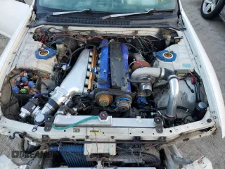 1995 Nissan Skyline z VIN ECR33060119, wystawiony jako Copart lot #76521404 z przebiegiem 134 480 mil mil oraz Szkoda całkowita • Salvage title. Historia ofert i sprzedaży dostępna na DreamBid. Obrazek 11.