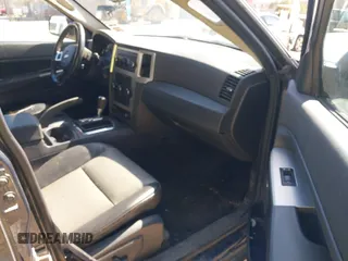 2008 Jeep Grand Cherokee Laredo with VIN 1J8GR48K98C161239, listed as a IAAI auction lot 42090850 with 218,063 mi miles. Bid and sale history available at carsss.com. Image 5.
