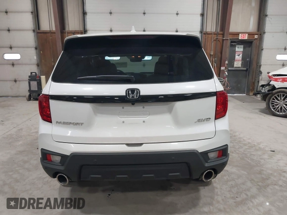 2025 Honda Passport EX-L z VIN 5FNYF8H5XSB017943, wystawiony jako IAAI lot #42027857 z przebiegiem 1 822 mil mil oraz . Historia ofert i sprzedaży dostępna na DreamBid. Obrazek 16.