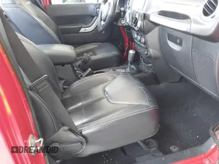 2014 Jeep Wrangler Unlimited Sahara z VIN 1C4BJWEGXEL179054, wystawiony jako IAAI lot #42151597 z przebiegiem 151 810 mil mil oraz . Historia ofert i sprzedaży dostępna na DreamBid. Obrazek 5.