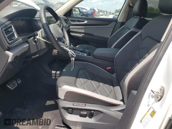 2024 Volkswagen Atlas Peak Edition SEL with VIN 1V2GR2CA0RC602704, listed as a Copart auction lot 57132995 with 11,474 mi miles and Salvage title. Bid and sale history available at DreamBid. Image 7.