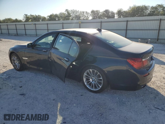 2015 BMW 7 Series 750Li with VIN WBAYE8C59FD781318, listed as a Copart auction lot 74053154 with 62,681 mi miles and Salvage Title. Bid and sale history available at carsss.com. Image 2.