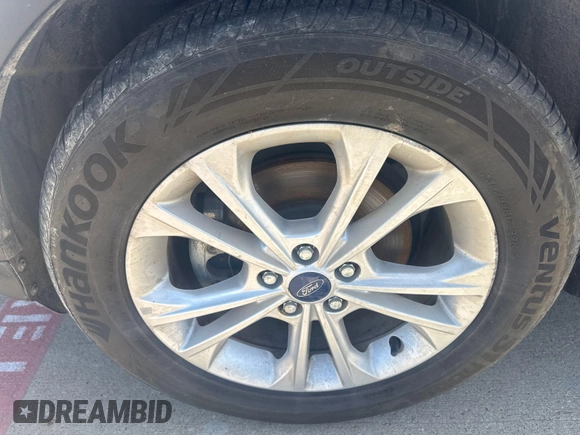 2017 Ford Escape SE with VIN 1FMCU0GD0HUC04680, listed as a IAAI auction lot 42202808 with 69,780 mi miles. Bid and sale history available at carsss.com. Image 1.