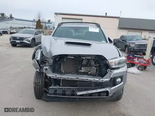2020 Toyota Tacoma 4WD SR5 with VIN 3TMCZ5AN6LM306311, listed as a IAAI auction lot 41220025 with 67,806 mi miles. Bid and sale history available at carsss.com. Image 13.