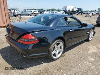 2009 Mercedes-Benz SL 550 with VIN WDBSK71F79F146967, listed as a Copart auction lot 62679494 with 57,412 mi miles and Salvage title. Bid and sale history available at DreamBid. Image 3.