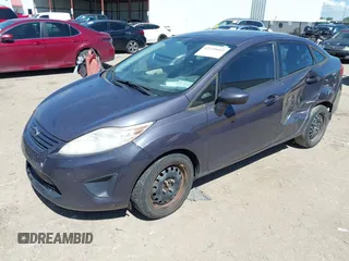 2013 Ford Fiesta S с VIN 3FADP4AJ7DM207683, выставлен на аукционе IAAI как лот 42220602 с пробегом 129 549 миль миль и . История ставок и продаж доступна на DreamBid. Изображение 2.