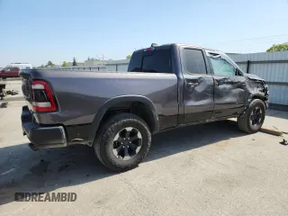 2019 Ram 1500 Rebel z VIN 1C6SRFET7KN875819, wystawiony jako Copart lot #57805775 z przebiegiem 80 521 mil mil oraz Szkoda całkowita • Salvage title. Historia ofert i sprzedaży dostępna na DreamBid. Obrazek 3.