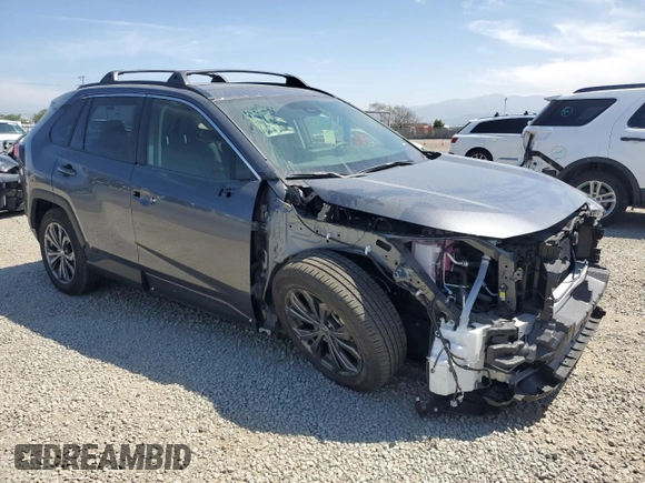 2025 Toyota RAV4 Hybrid XLE Premium with VIN JTMB6RFV8SD152327, listed as a Copart auction lot 53573615 with 12,830 mi miles and Salvage title. Bid and sale history available at DreamBid. Image 4.