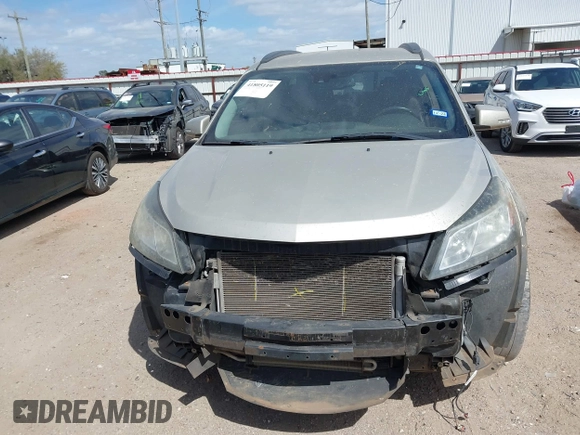 2014 Chevrolet Traverse LTZ z VIN 1GNKRJKDXEJ248849, wystawiony jako IAAI lot #41805119 z przebiegiem 171 489 mil mil oraz . Historia ofert i sprzedaży dostępna na DreamBid. Obrazek 13.