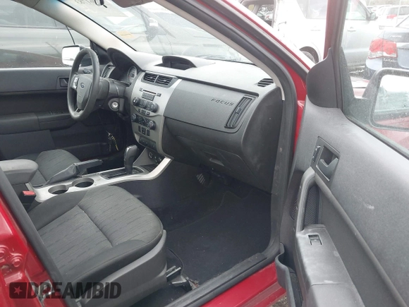 2009 Ford Focus SE with VIN 1FAHP35N09W136732, listed as a IAAI auction lot 42061783 with 143,993 mi miles. Bid and sale history available at carsss.com. Image 5.