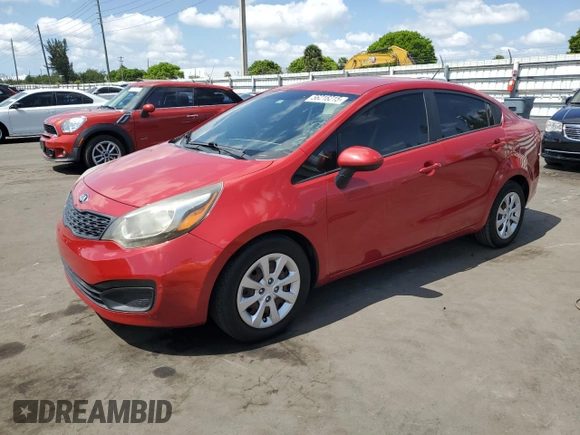 2014 Kia Rio LX with VIN KNADM4A33E6326527, listed as a Copart auction lot 56216215 with 98,340 mi miles and Clean Title. Bid and sale history available at DreamBid. Image 1.