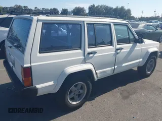 1996 Jeep Cherokee Sport with VIN 1J4FT68S7TL265733, listed as a IAAI auction lot 42499228 with 230,001 mi miles and . Bid and sale history available at DreamBid. Image 4.