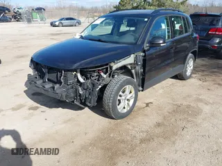 2017 Volkswagen Tiguan S with VIN WVGAV7AX6HK016922, listed as a IAAI auction lot 42032319 with 104,358 mi miles and . Bid and sale history available at DreamBid. Image 2.