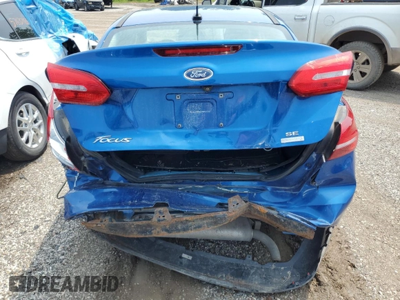 2018 Ford Focus SE with VIN 1FADP3FEXJL282378, listed as a Copart auction lot 59371975 with 30,029 mi miles and Salvage title. Bid and sale history available at DreamBid. Image 6.