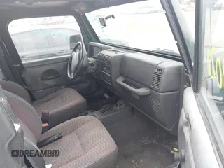 1999 Jeep Wrangler SE z VIN 1J4FY29P7XP479351, wystawiony jako IAAI lot #42797020 z przebiegiem 171 598 mil mil oraz . Historia ofert i sprzedaży dostępna na DreamBid. Obrazek 5.
