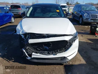 2021 Mazda CX-5 Grand Touring with VIN JM3KFBDM3M0417738, listed as a IAAI auction lot 41308123 with 90,134 mi miles. Bid and sale history available at carsss.com. Image 13.