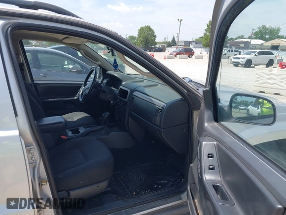 2004 Jeep Grand Cherokee Laredo with VIN 1J4GW48N94C420407, listed as a IAAI auction lot 42689372 with 217,768 mi miles and . Bid and sale history available at DreamBid. Image 5.