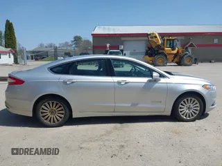 2013 Ford Fusion SE Hybrid with VIN 3FA6P0LU7DR196888, listed as a IAAI auction lot 42156366 with 393,358 mi miles. Bid and sale history available at carsss.com. Image 14.