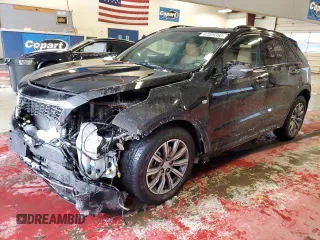 2022 Cadillac XT4 AWD Sport с VIN 1GYFZFR48NF166452, выставлен на аукционе Copart как лот 82009393 с пробегом 8 946 миль миль и Списание • Salvage title. История ставок и продаж доступна на DreamBid. Изображение 1.