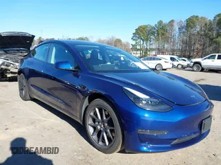 2022 Tesla Model 3 Long Range with VIN 5YJ3E1EB1NF257059, listed as a IAAI auction lot 41329318 with 30,652 mi miles. Bid and sale history available at carsss.com. Image 1.