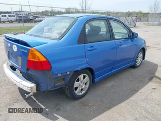 2003 Suzuki Aerio S z VIN JS2RA41S735169831, wystawiony jako IAAI lot #42025965 z przebiegiem 214 238 mil mil oraz . Historia ofert i sprzedaży dostępna na DreamBid. Obrazek 4.