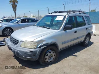 1999 Honda CR-V LX with VIN JHLRD2847XC000944, listed as a IAAI auction lot 42082593 with 198,474 mi miles. Bid and sale history available at carsss.com. Image 2.