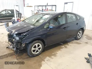 2015 Toyota Prius Four with VIN JTDKN3DU0F0460485, listed as a IAAI auction lot 42019819 with 61,200 mi miles. Bid and sale history available at carsss.com. Image 2.