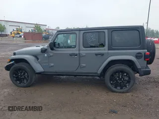2023 Jeep Wrangler Sahara with VIN 1C4JJXP6XPW698886, listed as a IAAI auction lot 42439690 with 41,787 mi miles and . Bid and sale history available at DreamBid. Image 14.