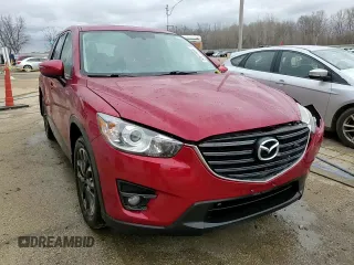 2016 Mazda CX-5 Grand Touring with VIN JM3KE4DY9G0771088, listed as a Copart auction lot 50615495 with 93,221 mi miles and Salvage Title. Bid and sale history available at DreamBid. Image 14.