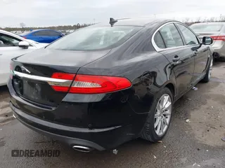 2013 Jaguar XF I4 RWD with VIN SAJWA0ES3DPS74714, listed as a IAAI auction lot 41298780 with 130,359 mi miles. Bid and sale history available at carsss.com. Image 4.