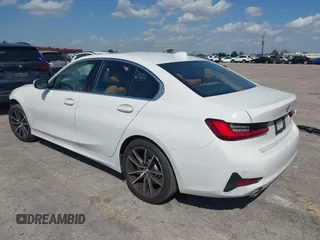 2022 BMW 3 Series 330i with VIN 3MW5R1J04N8C75820, listed as a IAAI auction lot 41702506 with 17,421 mi miles. Bid and sale history available at carsss.com. Image 3.