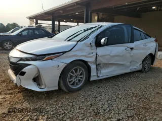 2021 Toyota Prius LE with VIN JTDKAMFP3M3175140, listed as a Copart auction lot 59325875 with 34,798 mi miles and Salvage title. Bid and sale history available at DreamBid. Image 1.