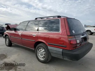 1988 Toyota Camry z VIN JT2SV21W9J0191632, wystawiony jako Copart lot #82323554 z przebiegiem 145 961 mil mil oraz Szkoda całkowita • Salvage title. Historia ofert i sprzedaży dostępna na DreamBid. Obrazek 2.