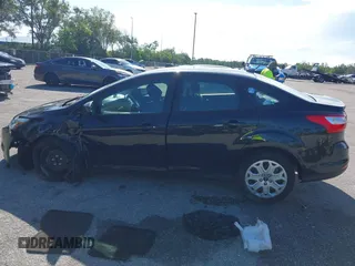 2012 Ford Focus SE with VIN 1FAHP3F22CL150631, listed as a IAAI auction lot 42594823 with 49,456 mi miles and . Bid and sale history available at DreamBid. Image 15.