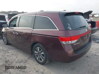 2015 Honda Odyssey Touring Elite with VIN 5FNRL5H9XFB026405, listed as a IAAI auction lot 41780562 with 134,897 mi miles and . Bid and sale history available at DreamBid. Image 3.