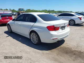 2013 BMW 3 Series 328i xDrive with VIN WBA3B5C51DJ599144, listed as a IAAI auction lot 42059260 with 84,153 mi miles. Bid and sale history available at carsss.com. Image 3.
