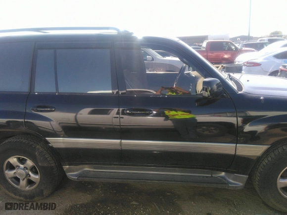 2001 Toyota Land Cruiser with VIN JTEHT05J512016563, listed as a IAAI auction lot 41868193 with 247,653 mi miles. Bid and sale history available at carsss.com. Image 13.